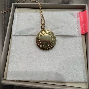 India Hicks gold “EXTRAORDINARY” token $45